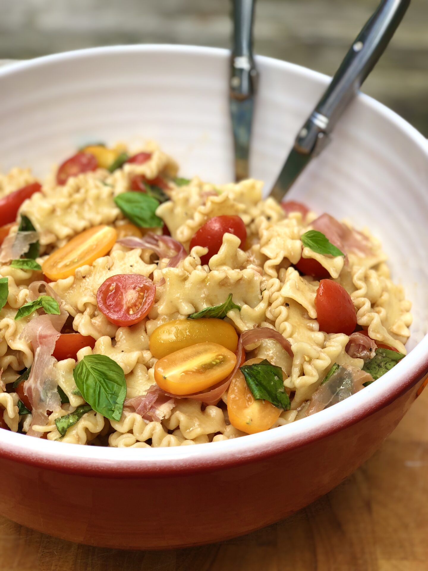 4B4E481B-7F6E-4991-9EE6-DE71936DD5BE Summer fresh pasta salad with malfetti tomatoes basil and prosciutto
