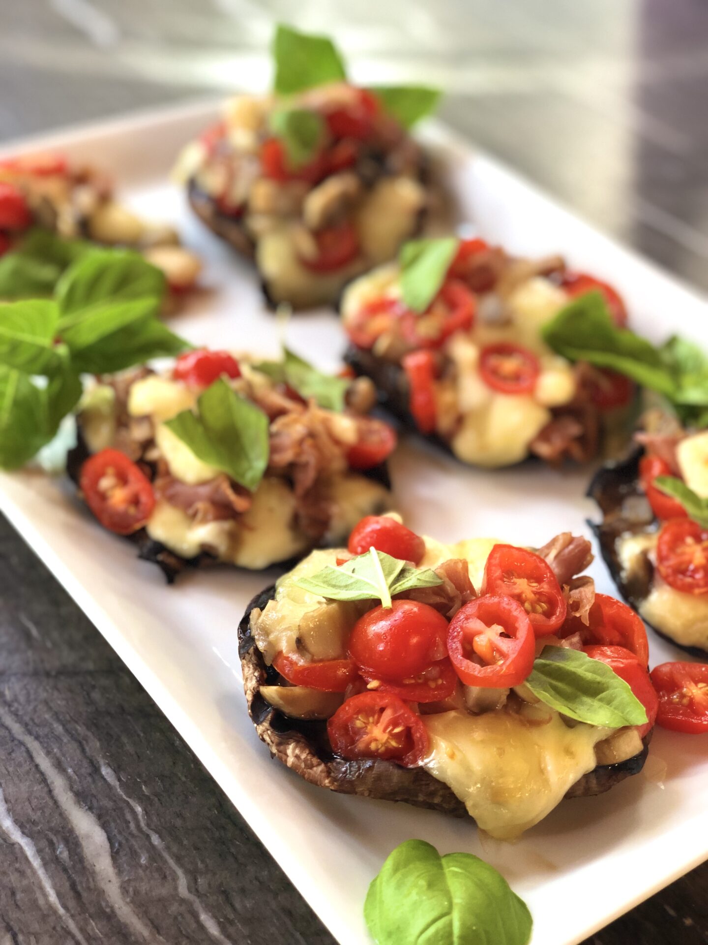 platter of italian stuffed portobello mushrooms