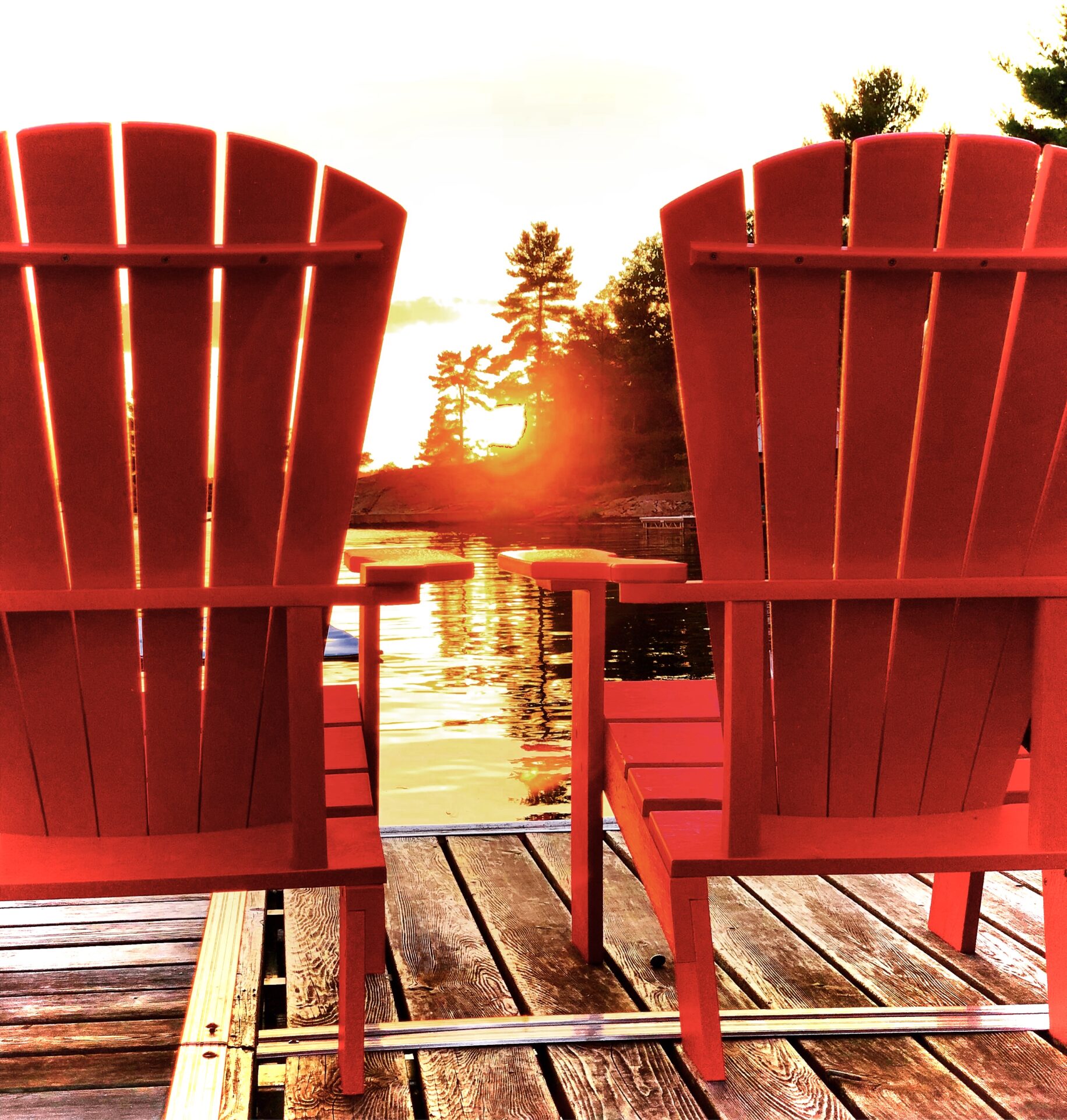 Sunset through the Muskoka Chairs