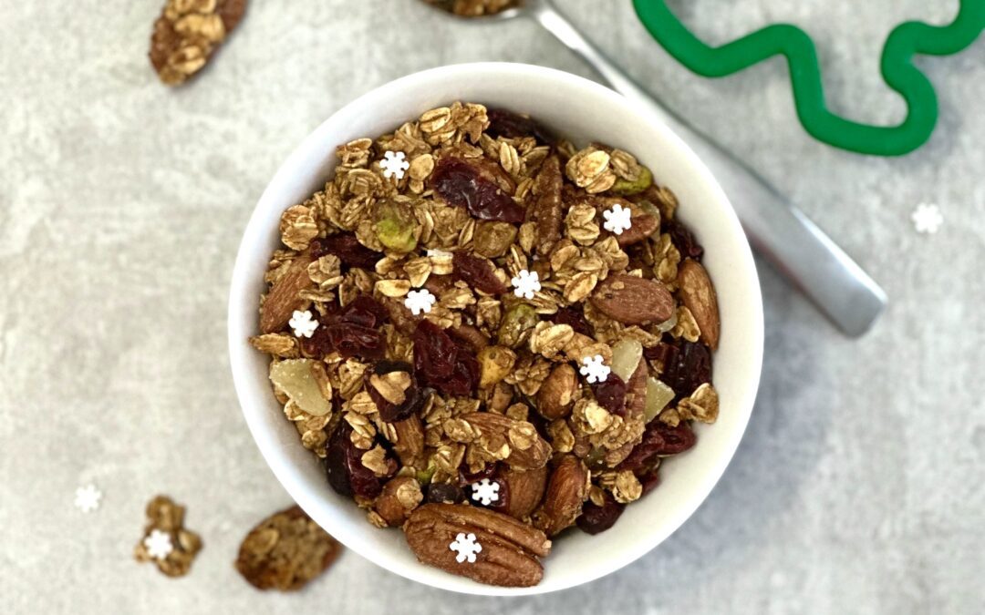 Homemade gingerbread granola with dried fruit nuts and snowflake sprinkles